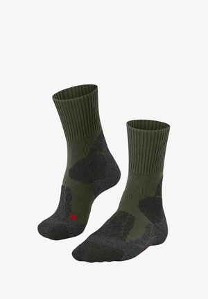 Kniesokken in donkergroen met geribde boorden, verstevigde tenen en donkergrijze patronen voor verbeterde duurzaamheid en comfort.