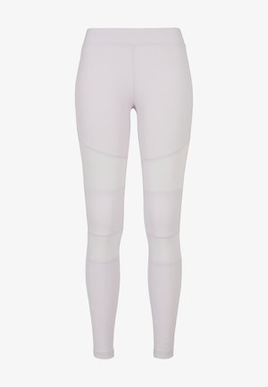 Lys grå leggings med et glat, strækbart stof. Har paneldesign med kontrasterende sektioner. Ingen synlig hardware eller accenter.