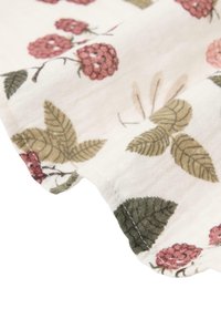 Cotton fabric featuring a floral pattern with pink raspberries and green leaves on a cream background. Slight texture and stitched edge.