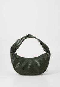 Green woven shoulder bag with a curved shape and a textured finish; features a zip closure and a thick, padded handle.
