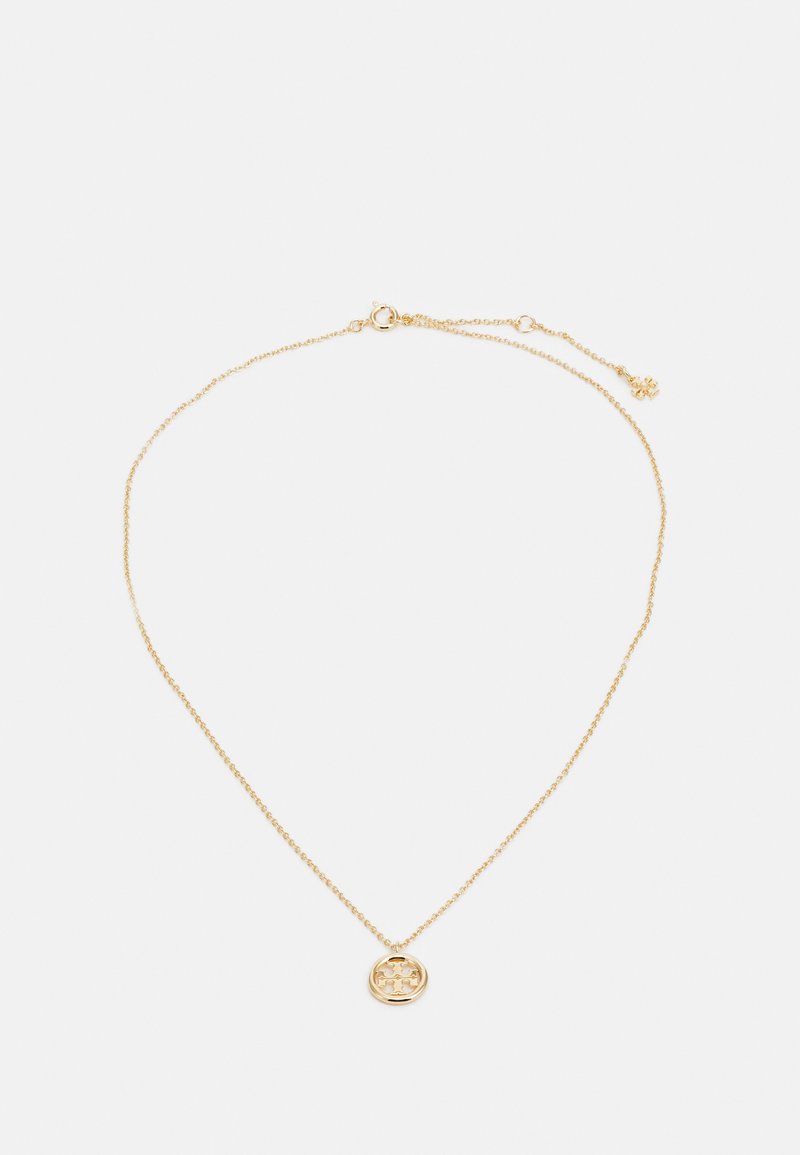 Gold chain necklace featuring a round pendant with a cut-out design. The chain is delicate and textured with a lobster clasp closure.