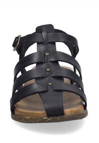 Schwarze Leder-Sandale mit mehreren überkreuzten Riemen, ausgestattet mit Metallnieten und einer verstellbaren Schnalle. Strukturierte Sohlen für besseren Halt.