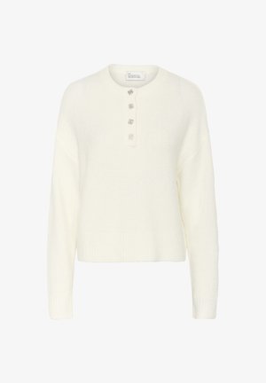 Bijela pletena pula s okruglim izrezom i tri dekorativna gumba. Ima rebraste rukave i obrub, što pruža mekanu teksturu.