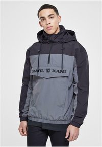 Karl Kani - RETRO SPLIT  - Windbreaker - black Thumbnail-Bild 1