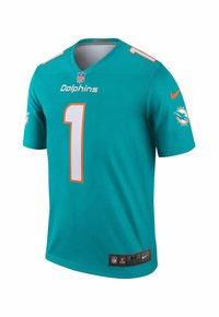 Miami Dolphins mez, türkiz színű narancs kiegészítőkkel. Az elülső és hátsó oldalon "1"-es szám található, a csapat neve fehérben, Nike logó a látható részen.