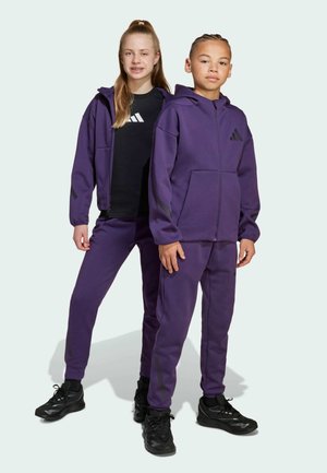adidas Performance JUNIOR - Tracksuit bottoms - aurora plum   aurora black