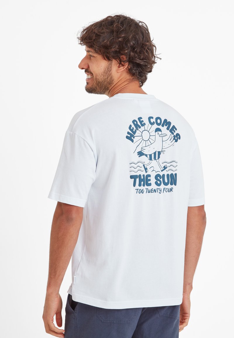White cotton t-shirt with short sleeves, featuring a blue graphic on the back that includes text and a cartoon bird above wavy lines.