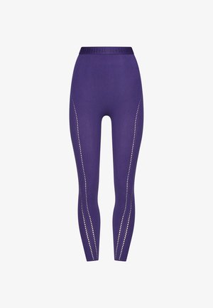 Lila leggings tillverkade av stretchigt material, med hög midja och prickiga accentmönster längs sidorna.