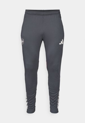 Graue Sporthosen mit enger Passform, ausgestattet mit einem elastischen Bund, weißem Adidas-Logo und drei weißen Streifen an den Seiten.