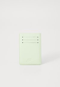 Mint green cardholder made of smooth leather, featuring four card slots with black stitching and embossed logo at the bottom.