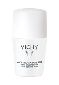 White roll-on deodorant with a rounded cap. Features a clear label with "VICHY" logo and "ANTI-TRANSPIRANT 48 H" text. Smooth texture.