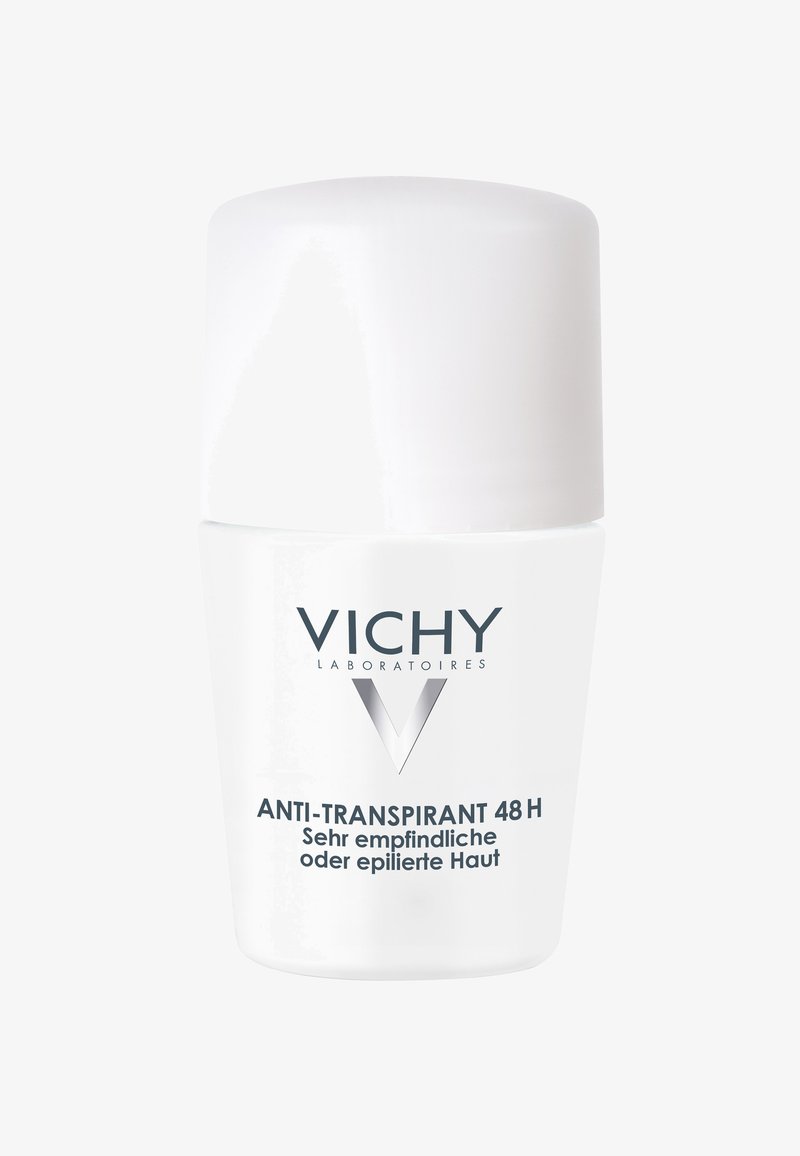 White roll-on deodorant with a rounded cap. Features a clear label with "VICHY" logo and "ANTI-TRANSPIRANT 48 H" text. Smooth texture.