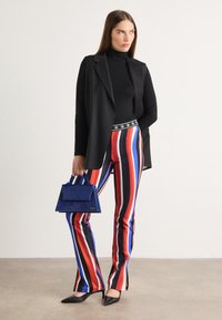 Marc Cain Leggings - Pantaloni - cranberry