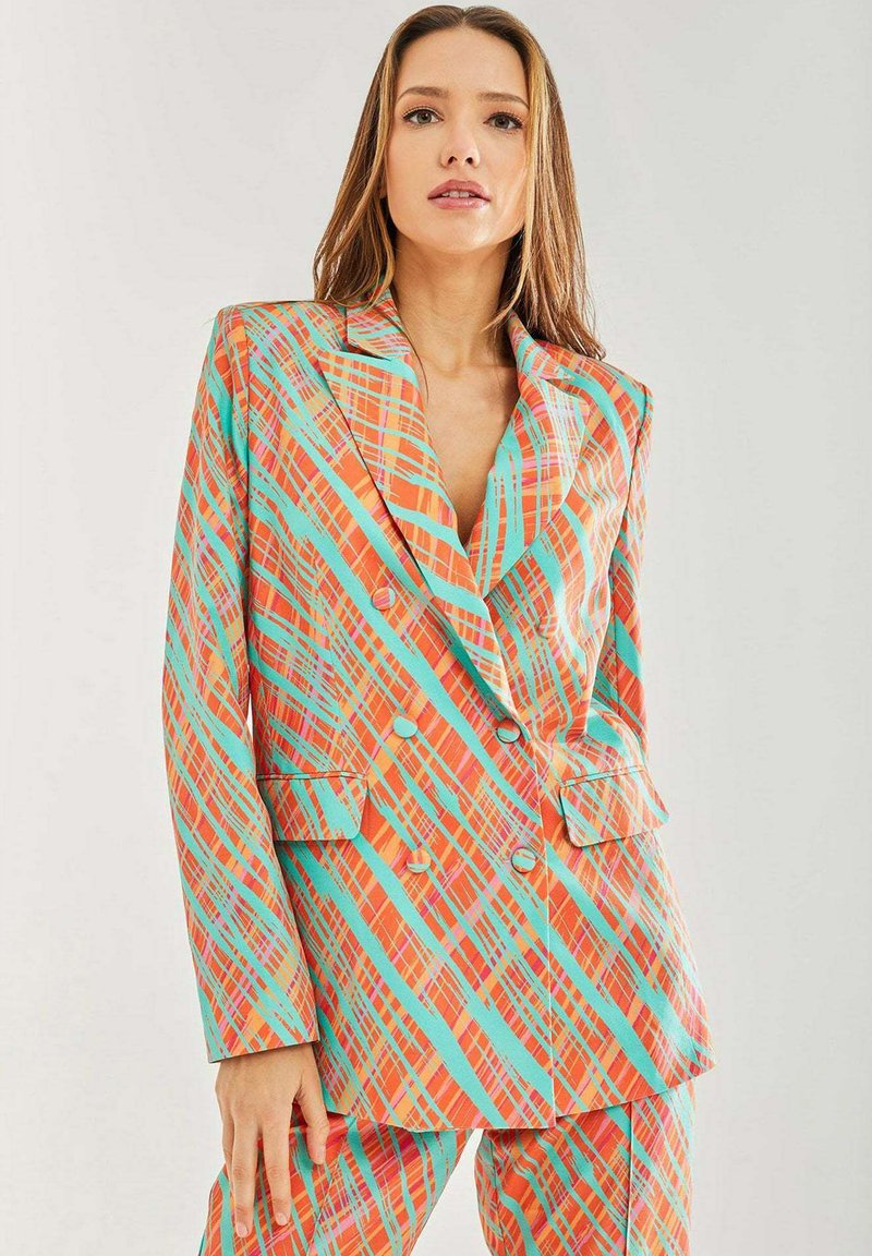 Colorful plaid blazer in orange, teal, and pink. Features double-breasted buttons, notched lapels, and side pockets. Smooth texture.