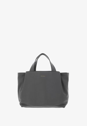 Black leather tote bag with double handles and small gold "Coccinelle" logo centered near top.