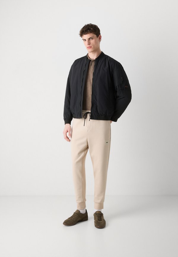 HADIKO  - Tracksuit bottoms - open beige3