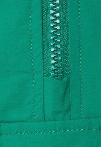 Karl Kani Vindjacka - turquoise