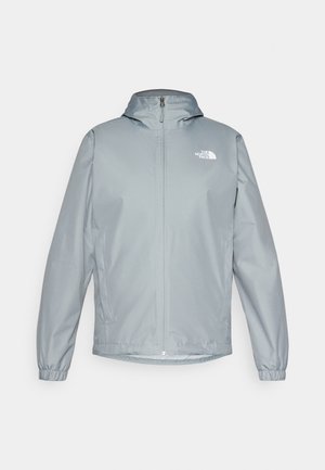 Light grey windbreaker jacket with a hood, elastic cuffs, front zipper, and a white logo on the left chest. Smooth, water-resistant material.