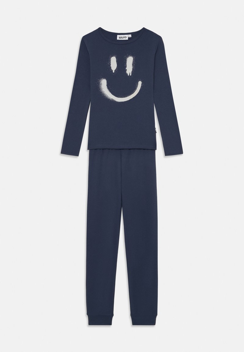 Conjunto de pijama de algodão azul-marinho, apresentando uma blusa de mangas longas com um gráfico de rosto sorridente branco e calças combinando com punhos elásticos.