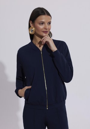 - Bluza rozpinana