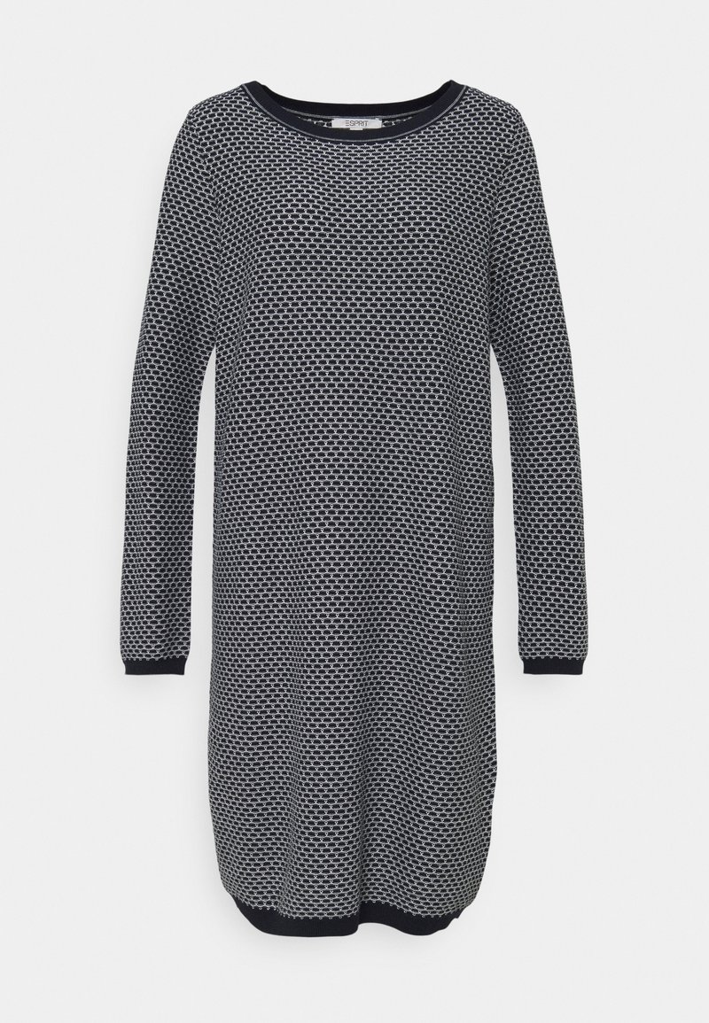 Robe tricotée à manches longues avec motif alvéolé noir et blanc, encolure ronde et poignets et ourlet noirs.