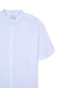 Kurzärmliges button-up Hemd in Hellblau, aus strukturiertem Stoff mit einem Stehkragen und sechs weißen Knöpfen entlang der Vorderseite. Reguläre Passform.