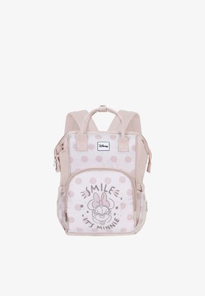 Sac à dos rose avec de grands pois, présentant une illustration de personnage sur la poche avant et le texte "SOURIS, C'EST MINNIE". Bretelles ajustables.