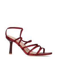 Red strappy sandal with a slim stiletto heel, open toe, and a smooth synthetic upper. Features crisscross straps and a beige insole.
