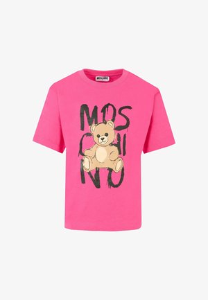Różowa bawełniana koszulka z grafiką wesołego misia i tekstem "MOSCHINO" w wyraźnym czarnym kolorze. Krótkie rękawy i klasyczny okrągły dekolt.