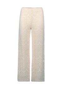 Pantalons larges en dentelle crochet complexe de couleur crème, présentant des motifs géométriques et une coupe décontractée.