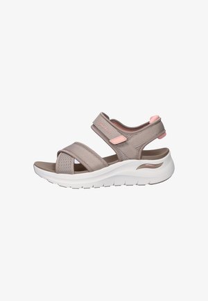 Women's taupe and pink Skechers sandal with adjustable straps and a thick white cushioned sole.