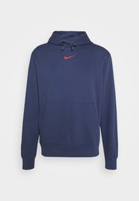 Navy blue sweatshirt with a red Nike logo on the chest, features a hood, drawstring, and front kangaroo pocket. Soft cotton material.