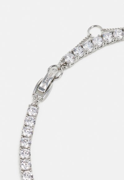 Silver bracelet featuring clear, round-cut crystals set in a flexible chain with a secure clasp, showcasing a polished finish.