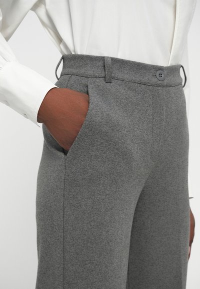 Gray wool trousers featuring a straight leg, side pockets, a button closure, and a clean, textured finish. Paired with a white shirt.