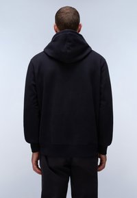Sudadera azul marino con cordón, puños y dobladillo acanalados. Fabricada en una suave tela texturizada, diseñada para un ajuste relajado.