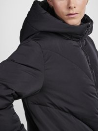 Black puffer jacket featuring a hood, zip closure, and quilted design. Smooth fabric with a matte finish and subtle stitching details.