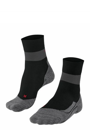 Schwarz- und graue Knöchelsocken mit einem gerippten Muster, ausgestattet mit gepolstertem Zehen- und Fersenbereich sowie einer engen Passform für Komfort beim Tragen.