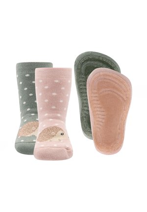 Helle rosa und grüne Socken mit einem Igel-Design und Punkten, ausgestattet mit einer strukturierten Sohle und weichem Material für Komfort.