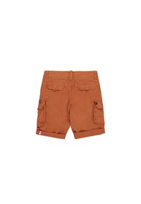 Rust-colored cargo shorts with multiple flap pockets on the back and sides, featuring belt loops and a small red tag on the hem.