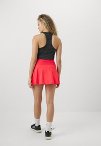 adidas Performance CLUB SKIRT - Jupe de sport - semi lucid red