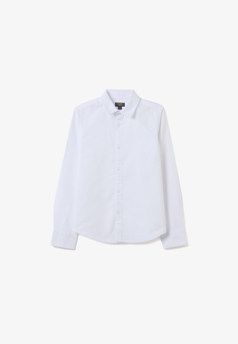 Camicia bianca a maniche lunghe con colletto tradizionale, taglio dritto e texture in cotone morbido. Presenta bottoni sulla parte anteriore.