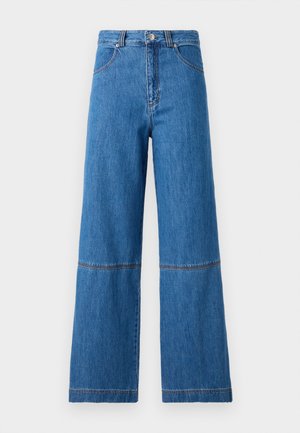 Wide-leg blue denim jeans with high waist, featuring double stitching at knee level and a textured fabric finish.