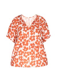 Kortærmet bluse med V-udskæring, lavet af hvidt stof prydet med store orange blomster mønstre og elastiske ærmer.