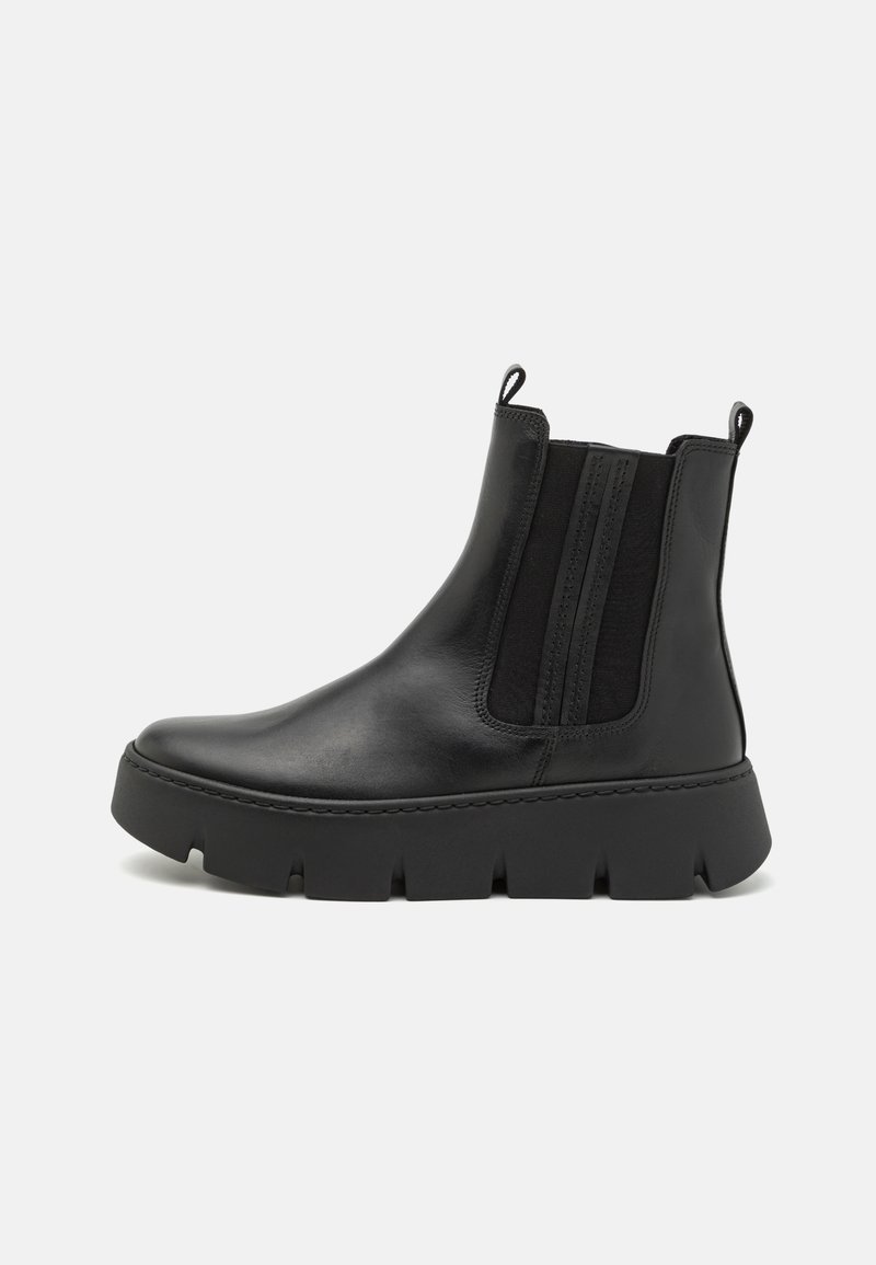 Black leather ankle boots with elastic side panels, rounded toe, and a chunky, textured sole. Features pull tabs for easy wear.