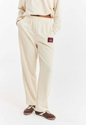 - Spodnie treningowe