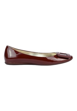 Burgundy patent leather flat shoe with square buckle detail on toe and low heel, shown from side on white background.