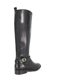 Knee-high black leather boot with a smooth finish, featuring a side panel, buckle accent at the ankle, and a low block heel.