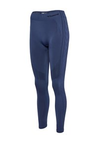 Marinblå träningsleggings med en strukturerad mönster på sidan, hög midja, och en smidig, kroppsnära design. Tillverkade av ett elastiskt material.