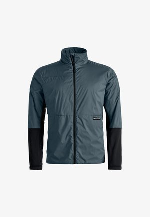 Lightweight, insulated jacket in dark teal with a high collar and black long sleeves. Features a front zipper and logo on the left side.