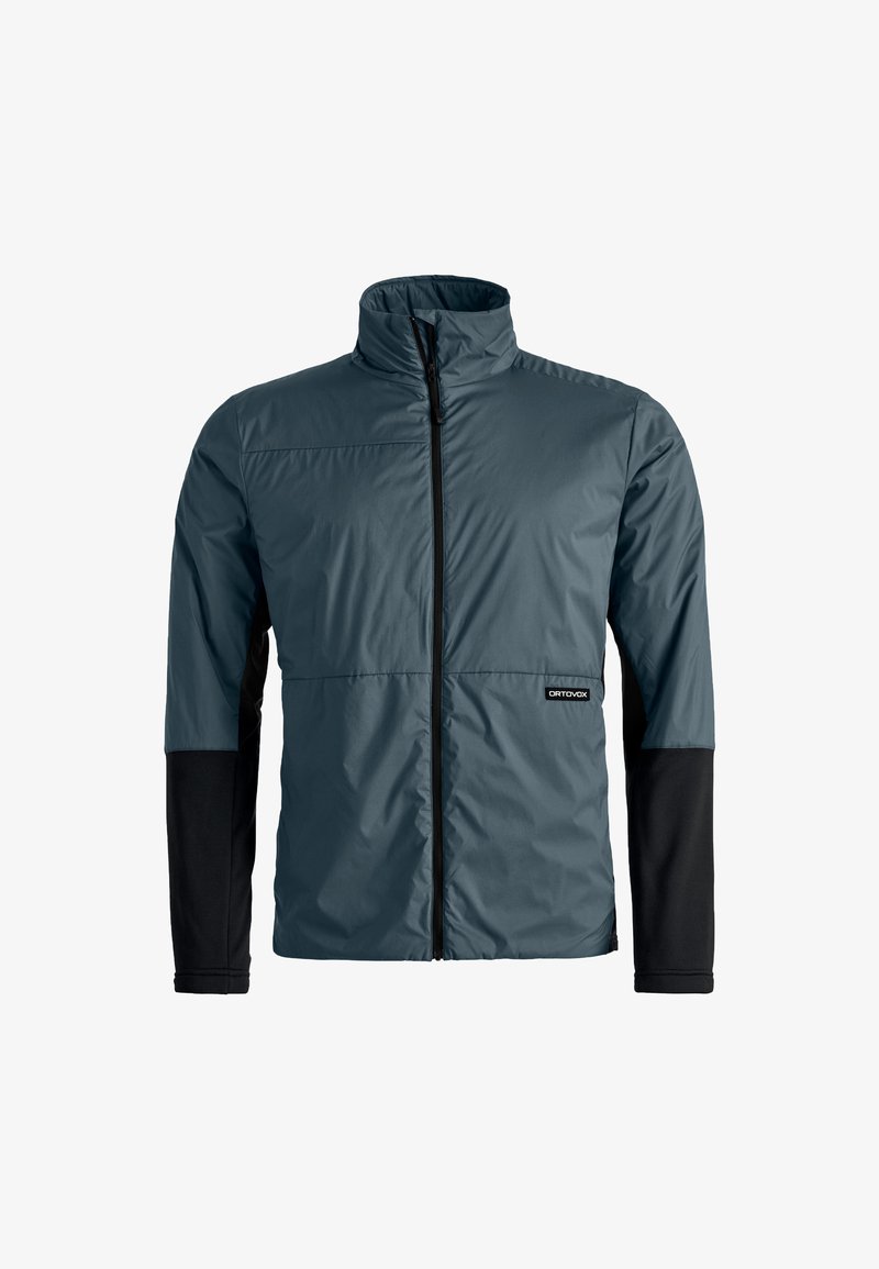 Leichte, isolierte Jacke in dunklem Blaugrün mit hohem Kragen und schwarzen langen Ärmeln. Mit einem Reißverschluss auf der Vorderseite und einem Logo auf der linken Seite.